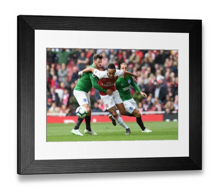 Framed Print : Clash at Emirates: Aubameyang vs. Gross in Arsenal's Battle Against Brighton