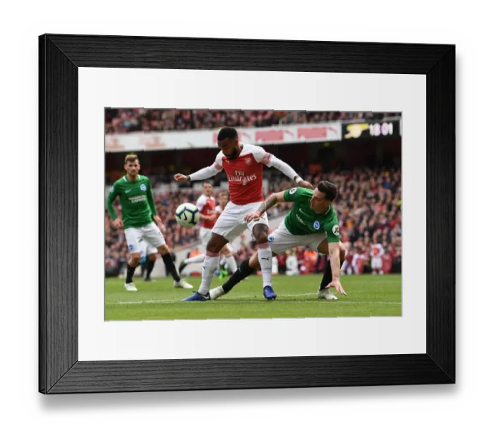 Framed Print : Arsenal's Lacazette Faces Off Against Brighton's Dunk in Intense Premier League Clash