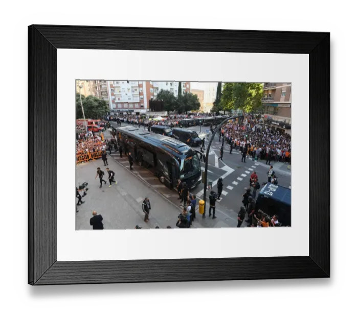 Framed Print : Arsenal's Europa League Semi-Final Arrival at Valencia: The Team Bus Approaches Estadio Mestalla