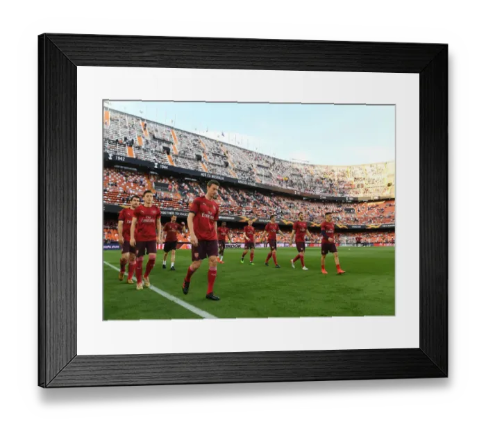 Framed Print : Arsenal's Laurent Koscielny Leads Pre-Match Warm-Up at Valencia's Estadio Mestalla (UEFA Europa League Semi-Final, Second Leg) Framed Print : Arsenal's Laurent Koscielny Leads Pre-Match Warm-Up at Valencia's Estadio Mestalla (UEFA Europa League Semi-Final, Second Leg)
