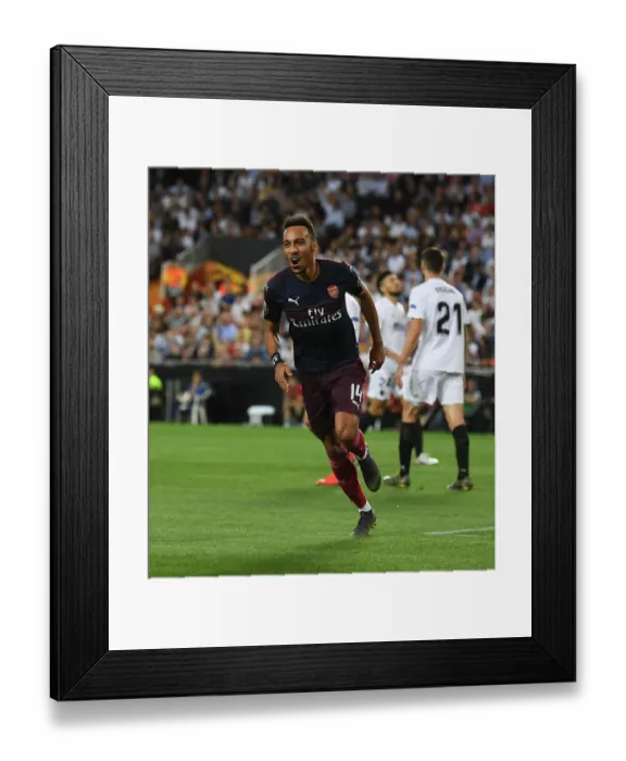 Framed Print : Aubameyang's Goal: Arsenal Advance in Europa League Semi-Final vs Valencia