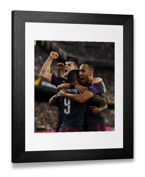 Framed Print : United in Victory: Aubameyang, Lacazette, and Xhaka's Goal Celebration - Arsenal's Europa League Semi-Final Triumph over Valencia