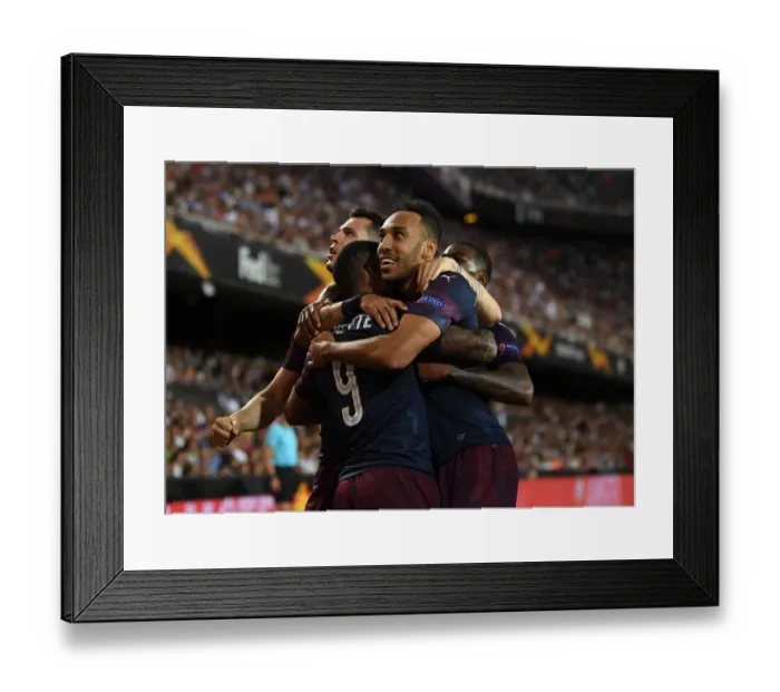 Framed Print : Arsenal's Aubameyang, Lacazette, and Xhaka Celebrate Goal in Europa League Semi-Final vs Valencia Framed Print : Arsenal's Aubameyang, Lacazette, and Xhaka Celebrate Goal in Europa League Semi-Final vs Valencia