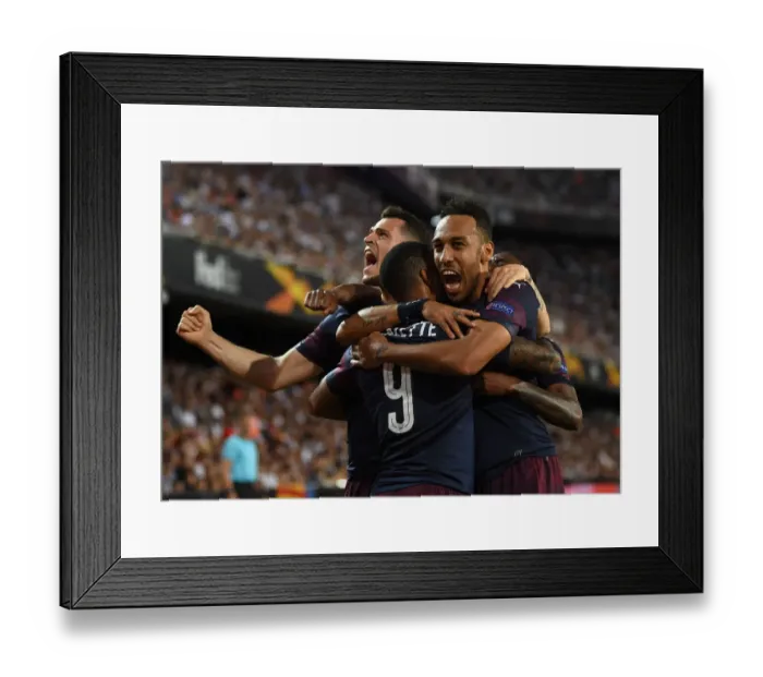 Framed Print : United in Victory: Aubameyang, Lacazette, and Xhaka's Goal Celebration - Arsenal's Europa League Semi-Final Triumph over Valencia