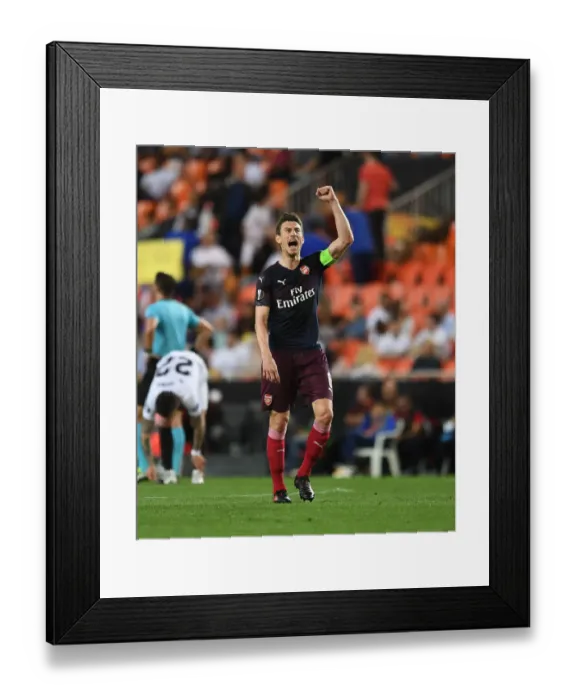 Framed Print : Arsenal's Europa League Triumph: Laurent Koscielny Celebrates Historic Fourth Goal vs Valencia (2018-19)
