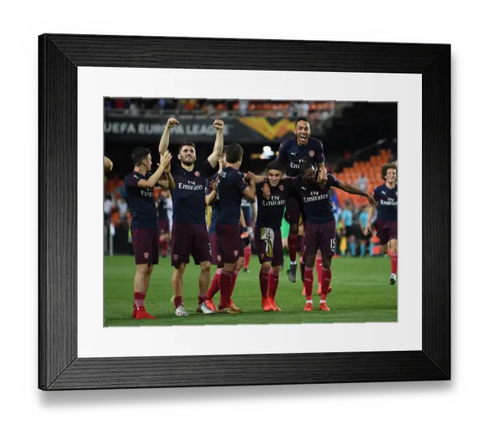 Framed Print : Arsenal's Europa League Victory: Ozil, Kolasinac, Torreira, Aubameyang, and Maitland-Niles Celebrate in Valencia