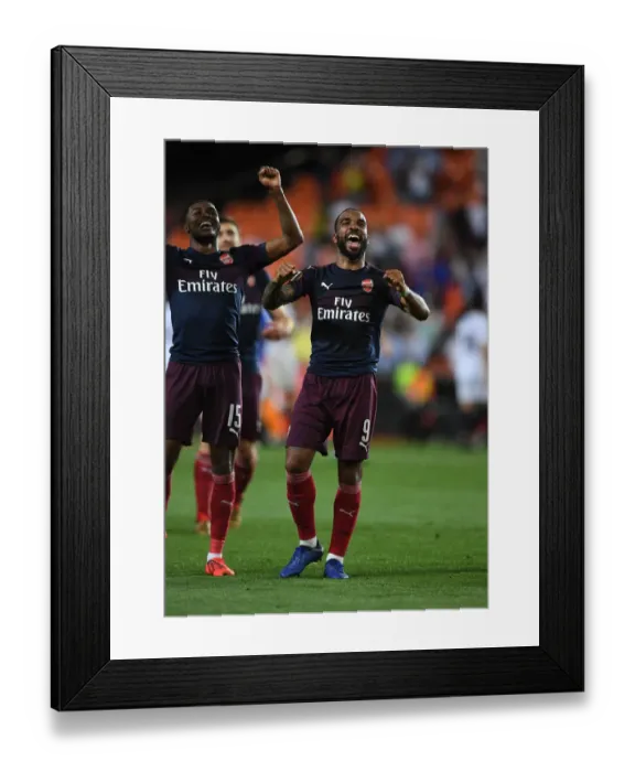 Framed Print : Alexandre Lacazette's Europa League Glory: Arsenal's Triumph Over Valencia Framed Print : Alexandre Lacazette's Europa League Glory: Arsenal's Triumph Over Valencia