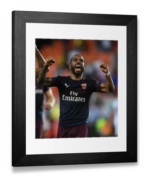 Framed Print : Alexandre Lacazette's Europa League Victory: Arsenal's Triumph Over Valencia