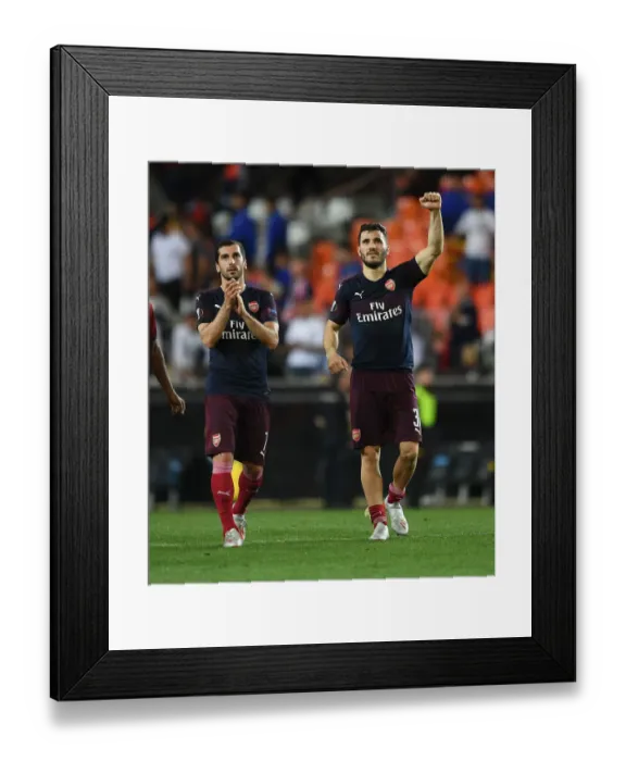 Framed Print : Arsenal's Mkhitaryan and Kolasinac Celebrate Europa League Semi-Final Victory over Valencia