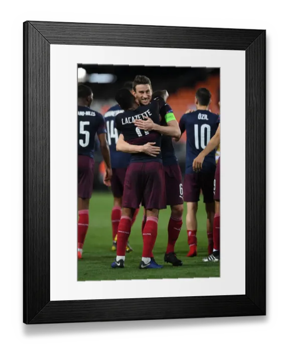 Framed Print : Arsenal's Emotional Reunion: Lacazette and Koscielny Hug After Europa League Semifinal Victory Framed Print : Arsenal's Emotional Reunion: Lacazette and Koscielny Hug After Europa League Semifinal Victory