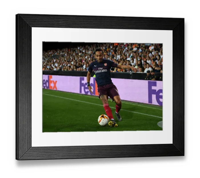 Framed Print : Arsenal's Aubameyang Goes Head-to-Head with Valencia in Europa League Semi-Final Clash