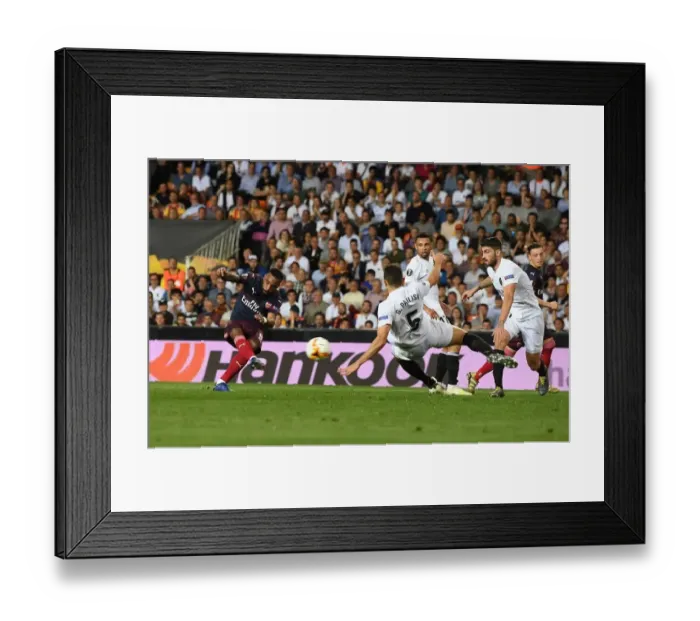 Framed Print : Alexis Lacazette Scores in Arsenal's Europa League Victory over Valencia