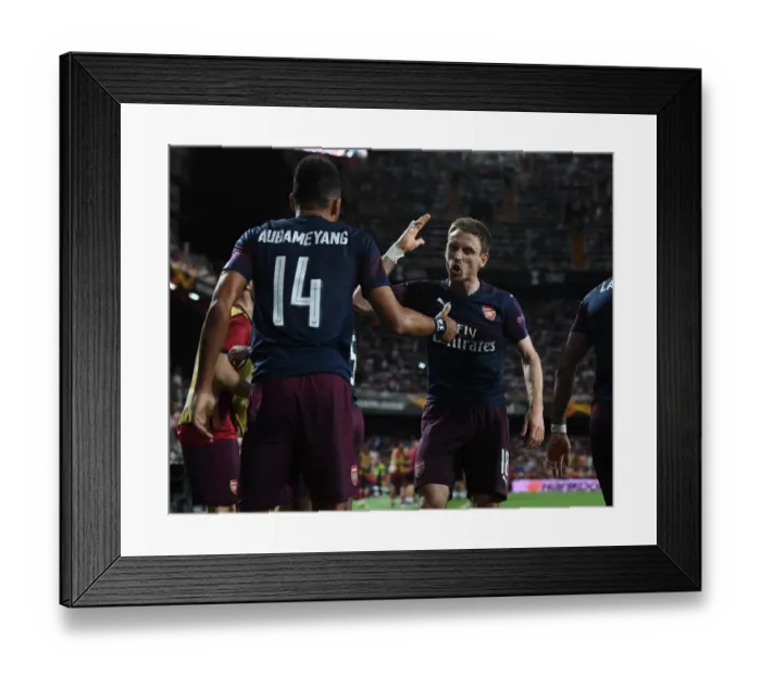 Framed Print : Arsenal's Aubameyang and Monreal Celebrate Goal in Europa League Semi-Final vs Valencia Framed Print : Arsenal's Aubameyang and Monreal Celebrate Goal in Europa League Semi-Final vs Valencia