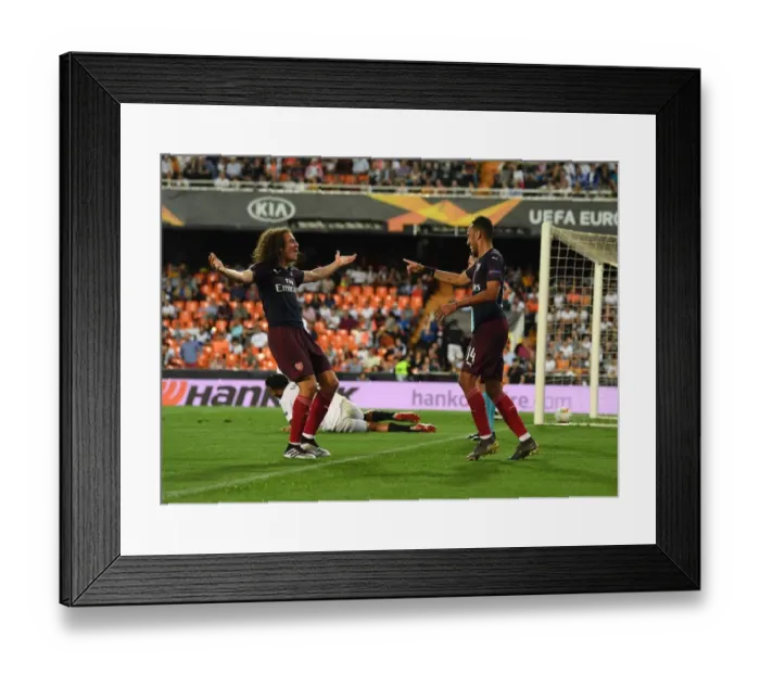 Framed Print : Arsenal's Aubameyang and Guendouzi Celebrate Goals in Europa League Semi-Final vs Valencia
