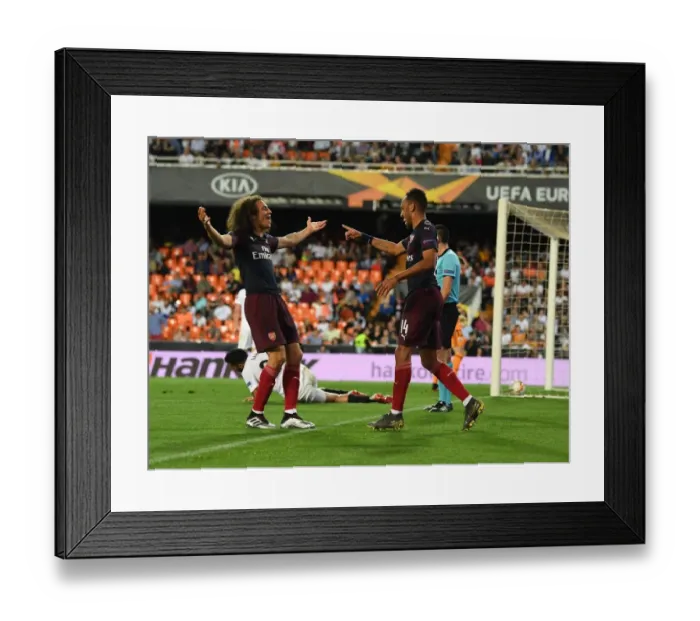 Framed Print : Arsenal's Aubameyang and Guendouzi Celebrate Goals in Europa League Semi-Final vs Valencia
