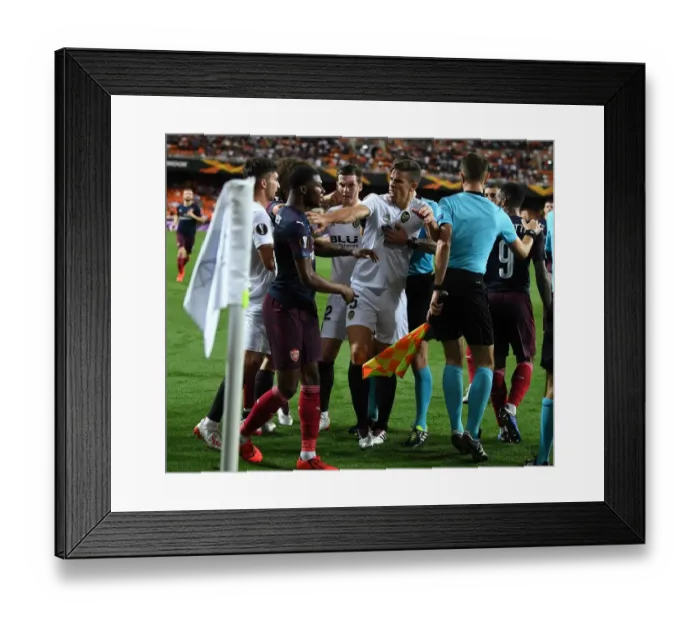 Framed Print : Clash of Titans: Ainsley Maitland-Niles vs. Gabriel in the UEFA Europa League Semi-Final Showdown Framed Print : Clash of Titans: Ainsley Maitland-Niles vs. Gabriel in the UEFA Europa League Semi-Final Showdown