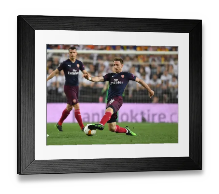 Framed Print : Nacho Monreal in Action: Arsenal's Europa League Semi-Final Showdown in Valencia
