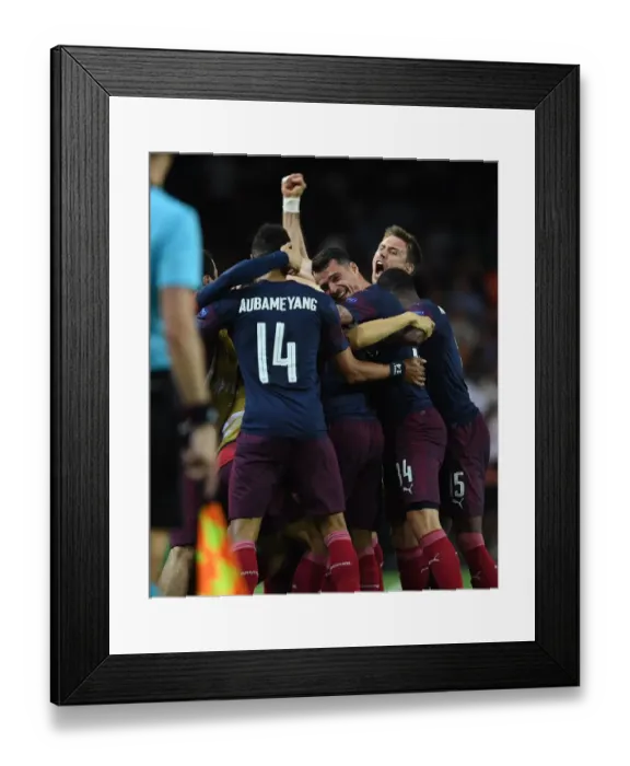 Framed Print : Arsenal's Europa League Double Victory: Aubameyang, Xhaka, and Monreal's Triumphant Celebration (2018-19)