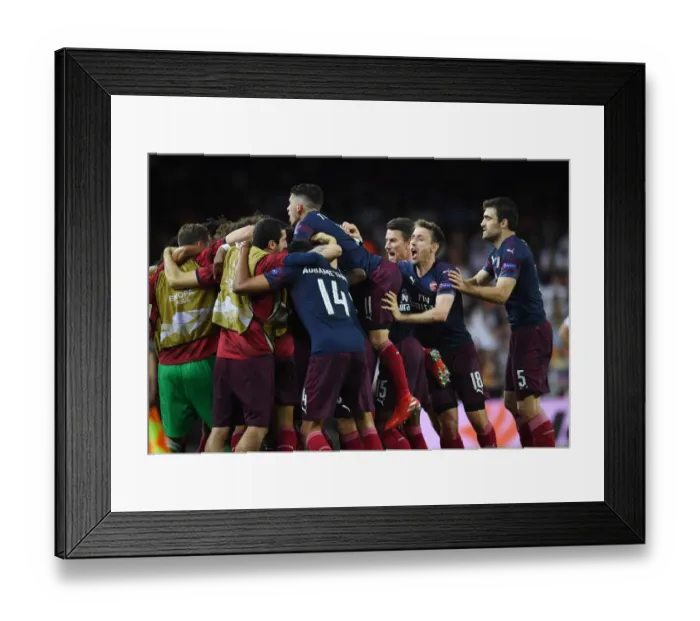 Framed Print : Arsenal Celebrates Double Advantage in Europa League Semi-Final vs Valencia