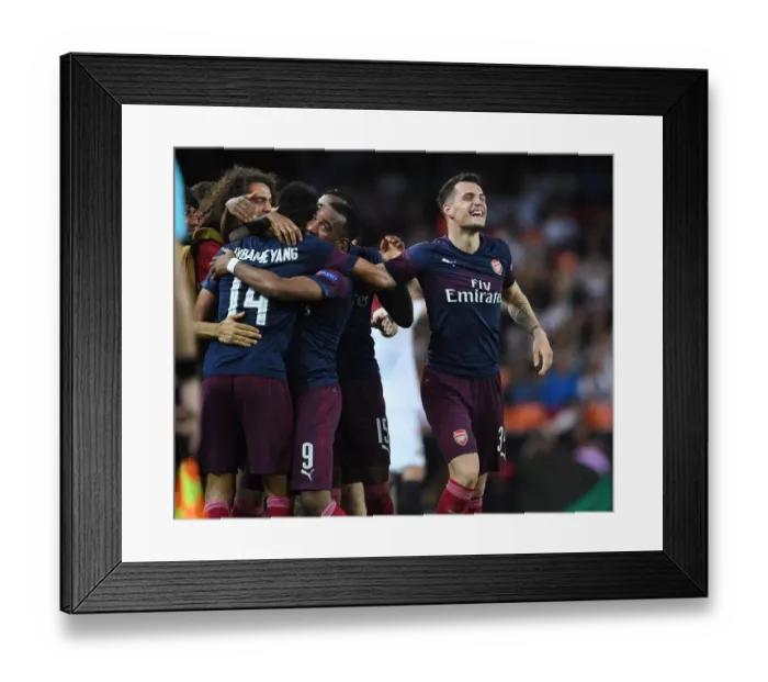 Framed Print : Granit Xhaka's Brace: Arsenal Secures Europa League Final Spot vs. Valencia