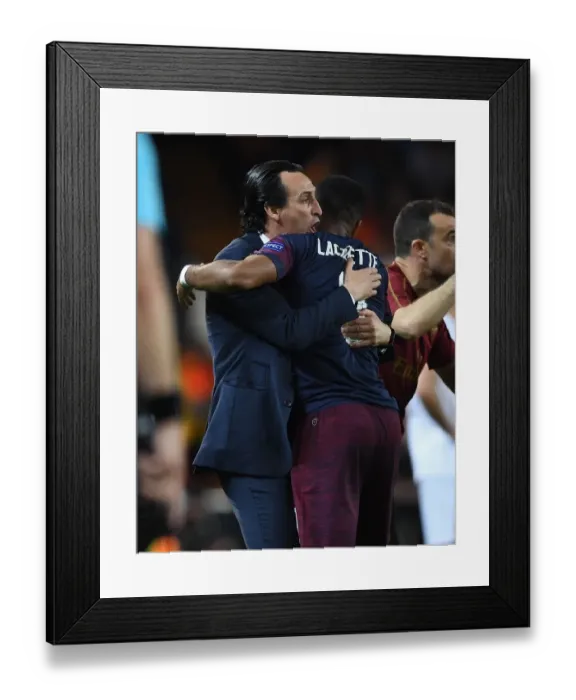 Framed Print : Unai Emery and Alex Lacazette's Emotional Moment: Arsenal's Europa League Semi-Final Victory over Valencia