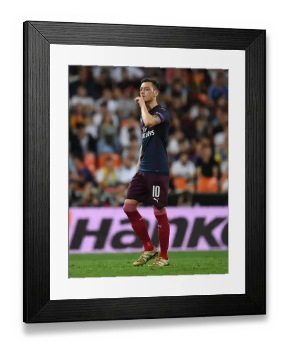 Framed Print : Mesut Ozil Bids Emotional Farewell to Valencia Fans After Arsenal's Europa League Exit