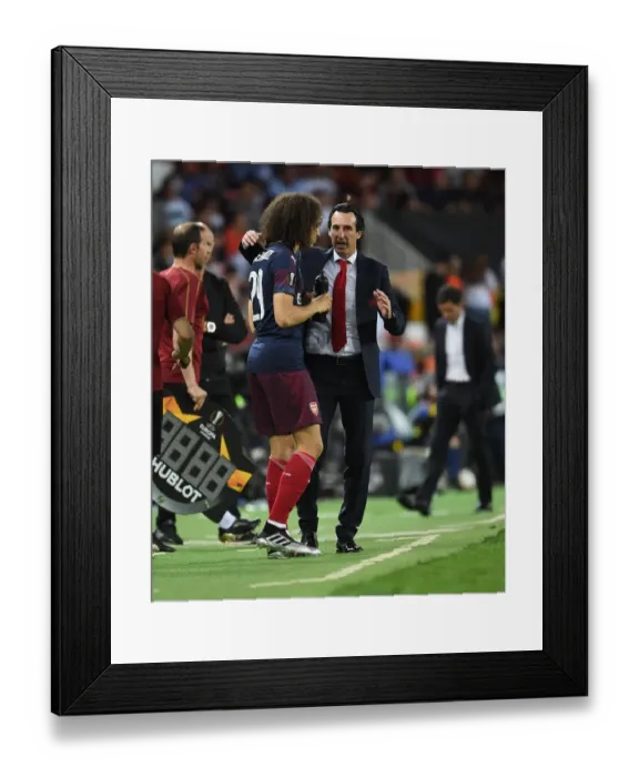 Framed Print : Unai Emery's Tense Exchange with Matteo Guendouzi during Arsenal's Europa League Semi-Final vs Valencia Framed Print : Unai Emery's Tense Exchange with Matteo Guendouzi during Arsenal's Europa League Semi-Final vs Valencia