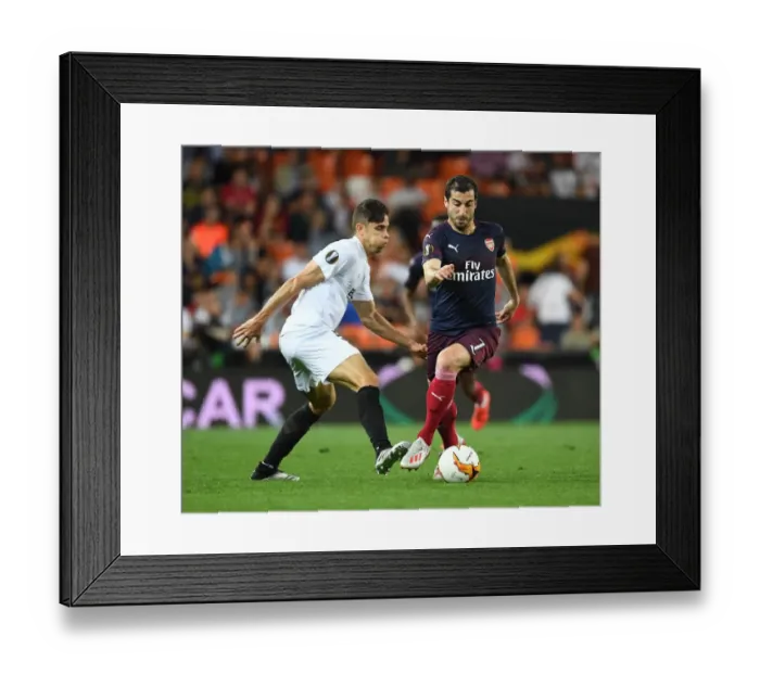 Framed Print : Mkhitaryan Breaks Past Gabriel: Arsenal's Europa League Semi-Final Battle at Valencia Framed Print : Mkhitaryan Breaks Past Gabriel: Arsenal's Europa League Semi-Final Battle at Valencia