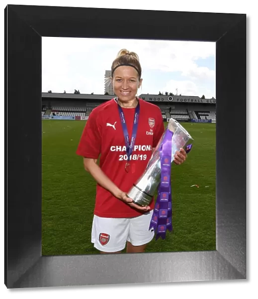 Arsenal Women's Historic WSL Title Win: Janni Arnth Celebrates with the Trophy