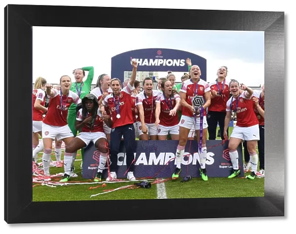 BOREHAMWOOD, ENGLAND - MAY 11: The Arsenal Women lift the WSL Trophy after the match between Arsenal Women