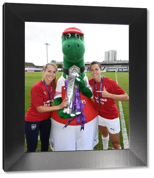 Arsenal Women Celebrate with Gunnersaurus after Securing Victory over Manchester City
