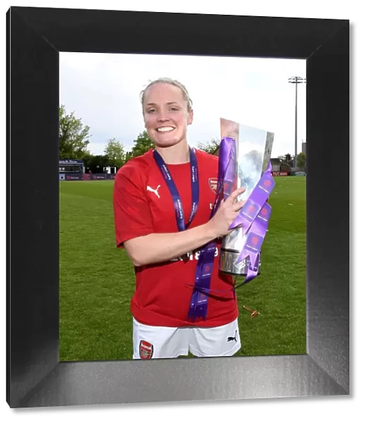 Arsenal's Kim Little Lifts WSL Trophy: Celebrating Championship Win over Manchester City