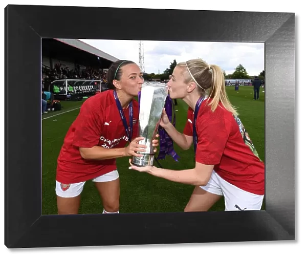 Arsenal Women Celebrate WSL Title Win: Leah Williamson and Katie McCabe Hold the Trophy
