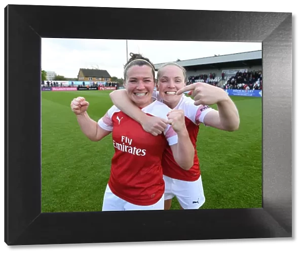 Arsenal Women's Mitchell and Little in Triumphant Victory Celebration