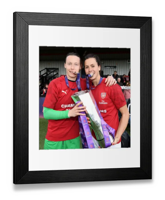 Framed Print : Arsenal Women Celebrate Historic WSL Title Win: Peyraud-Magnin and Schnaderbeck Hold the Trophy