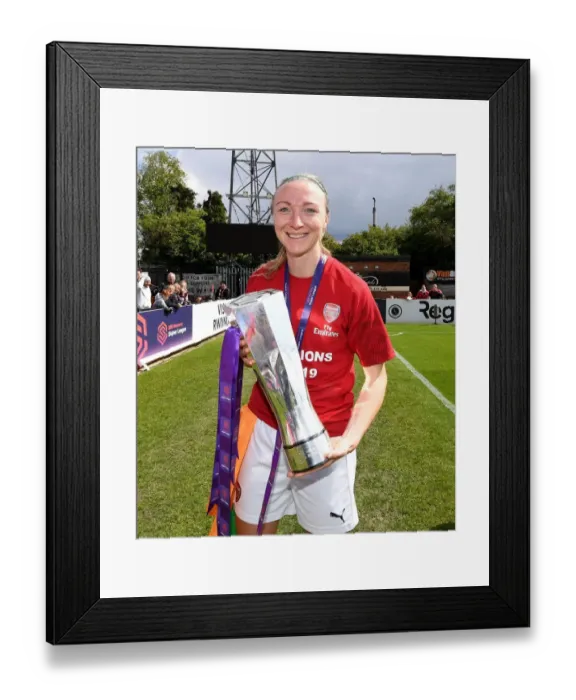 Framed Print : Louise Quinn Lifts WSL Trophy: Arsenal Women's Triumph over Manchester City