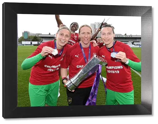 Arsenal Women's Team Celebrates WSL Title with Goalkeepers Sari van Veenendaal, Leanne Hall, and Pauline Peyraud-Magnin
