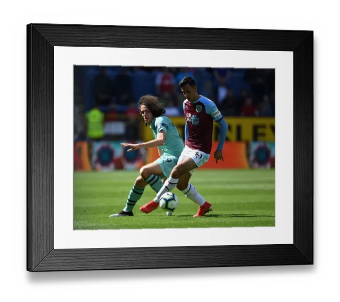 Framed Print : Clash at Turf Moor: Guendouzi vs. McNeil in Intense Burnley vs. Arsenal Premier League Encounter