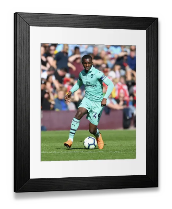 Framed Print : Arsenal's Eddie Nketiah Faces Off Against Burnley in Premier League Clash Framed Print : Arsenal's Eddie Nketiah Faces Off Against Burnley in Premier League Clash