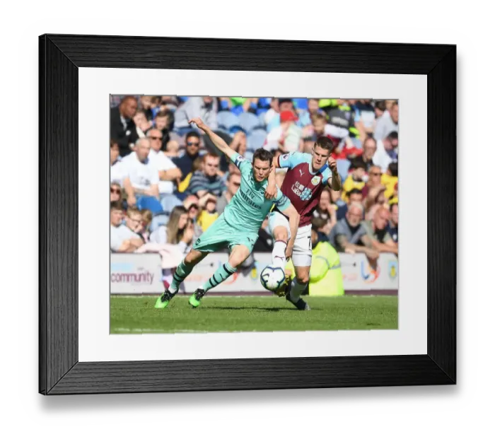 Framed Print : Stephan Lichtsteiner vs Johann Berg Gudmundsson: Intense Clash Between Burnley and Arsenal in Premier League