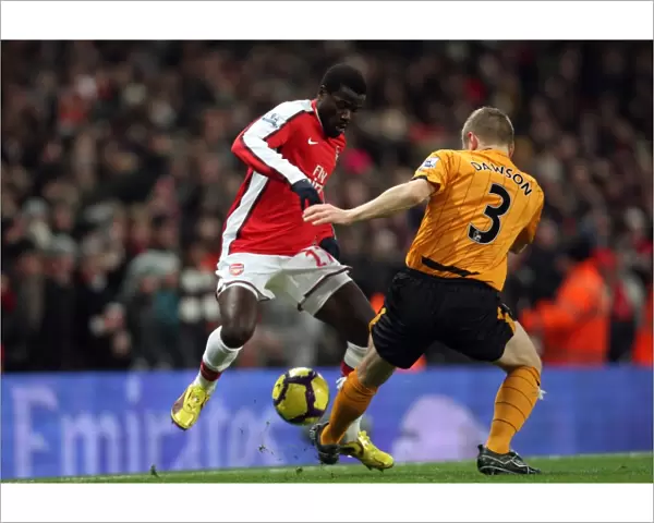 Emmanuel Eboue (Arsenal) Andy Dawson (Hull). Arsenal 3: 0 Hull City. Barclays Premier League