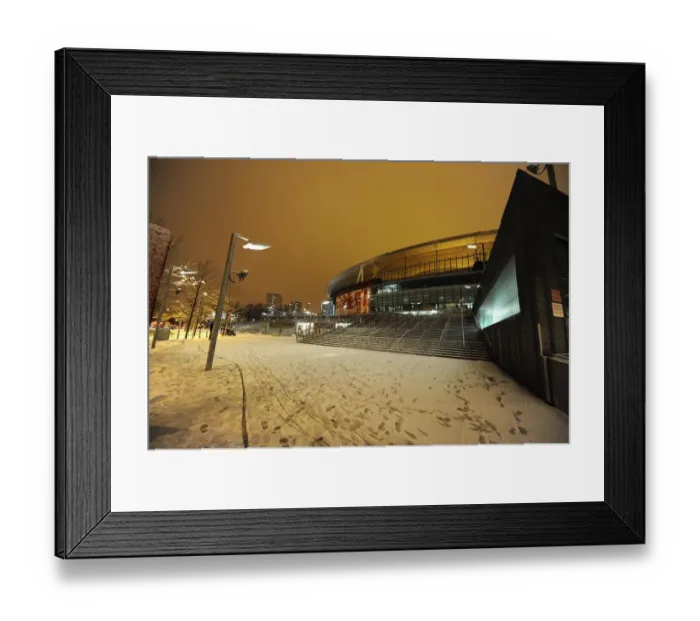 Framed Print : Winter's Embrace at Emirates Stadium: Arsenal's Snow-Covered Fortress, London (2009)