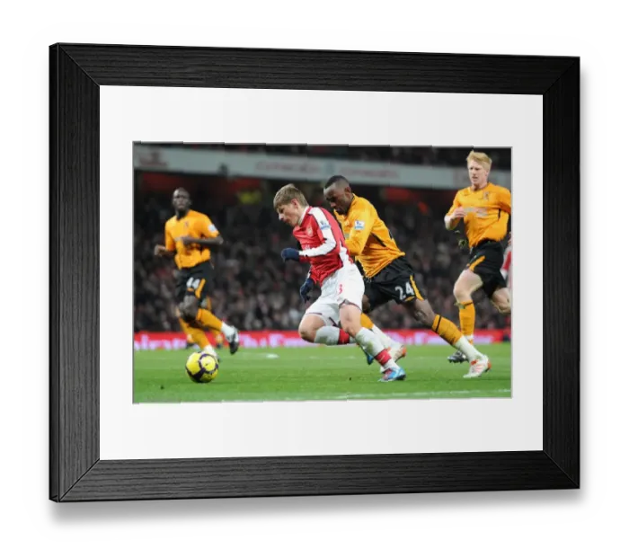 Framed Print : Andrey Arshavin (Arsenal) Kamil Zayatte (Hull). Arsenal 3: 0 Hull City, Barclays Premier league
