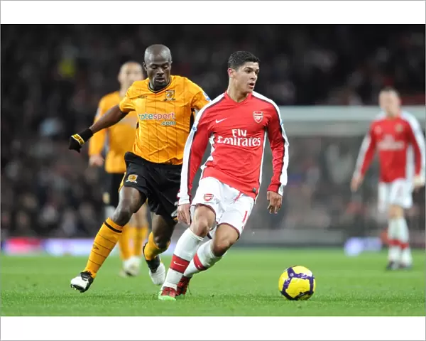 Denilson (Arsenal) George Boateng (Hull). Arsenal 3: 0 Hull City, Barclays Premier league