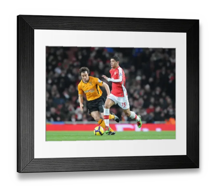 Framed Print : Denilson (Arsenal) Stephen Hunt (Hull). Arsenal 3: 0 Hull City, Barclays Premier league Framed Print : Denilson (Arsenal) Stephen Hunt (Hull). Arsenal 3: 0 Hull City, Barclays Premier league