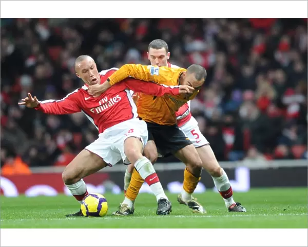Mikael Silvestre (Arsenal) Craig Fagan (Hull). Arsenal 3: 0 Hull City, Barclays Premier league