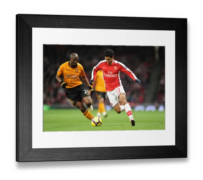 Framed Print : Arsenal's Carlos Vela Scores Three against Hull's George Boateng: 3-0 Premier League Victory at Emirates Stadium