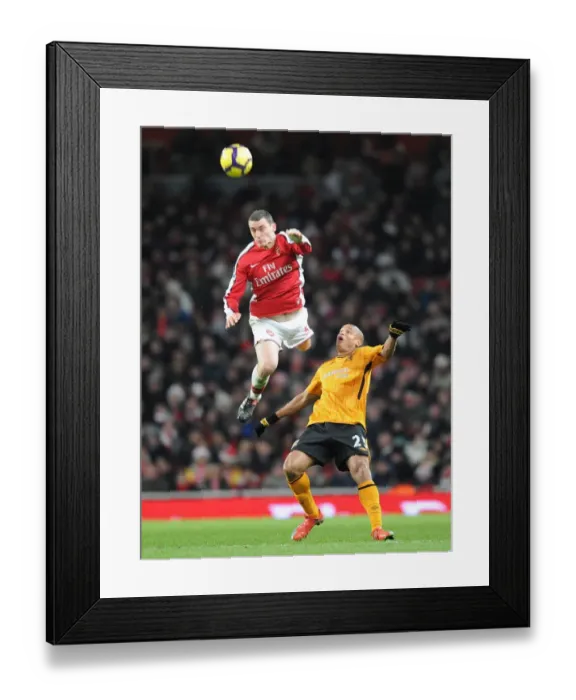 Framed Print : Thomas Vermaelen (Arsenal) Daniel Cousin (Hull). Arsenal 3: 0 Hull City