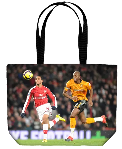 Theo Walcott (Arsenal) Anthony Gardner (Hull). Arsenal 3: 0 Hull City, Barclays Premier league