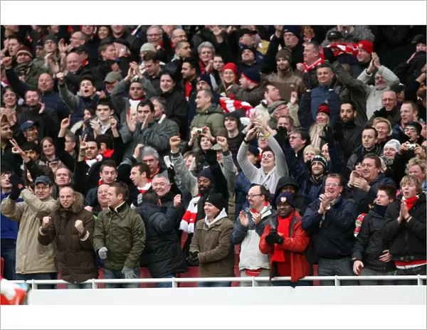 Arsenal fans celebrate the 1st goal. Arsenal 3: 0 Aston Villa. Barclays Premier League